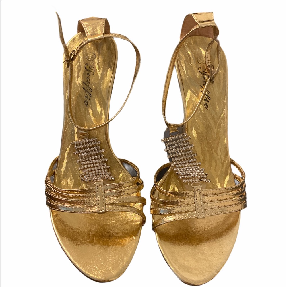 Woman’s gold heels